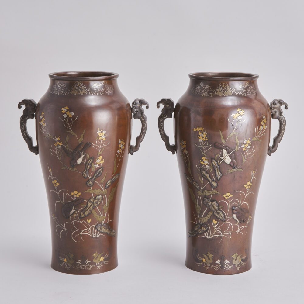 An attractive pair of late 19th Century inlaid and onlaid Bronze Japanese vases from Kevin Page
