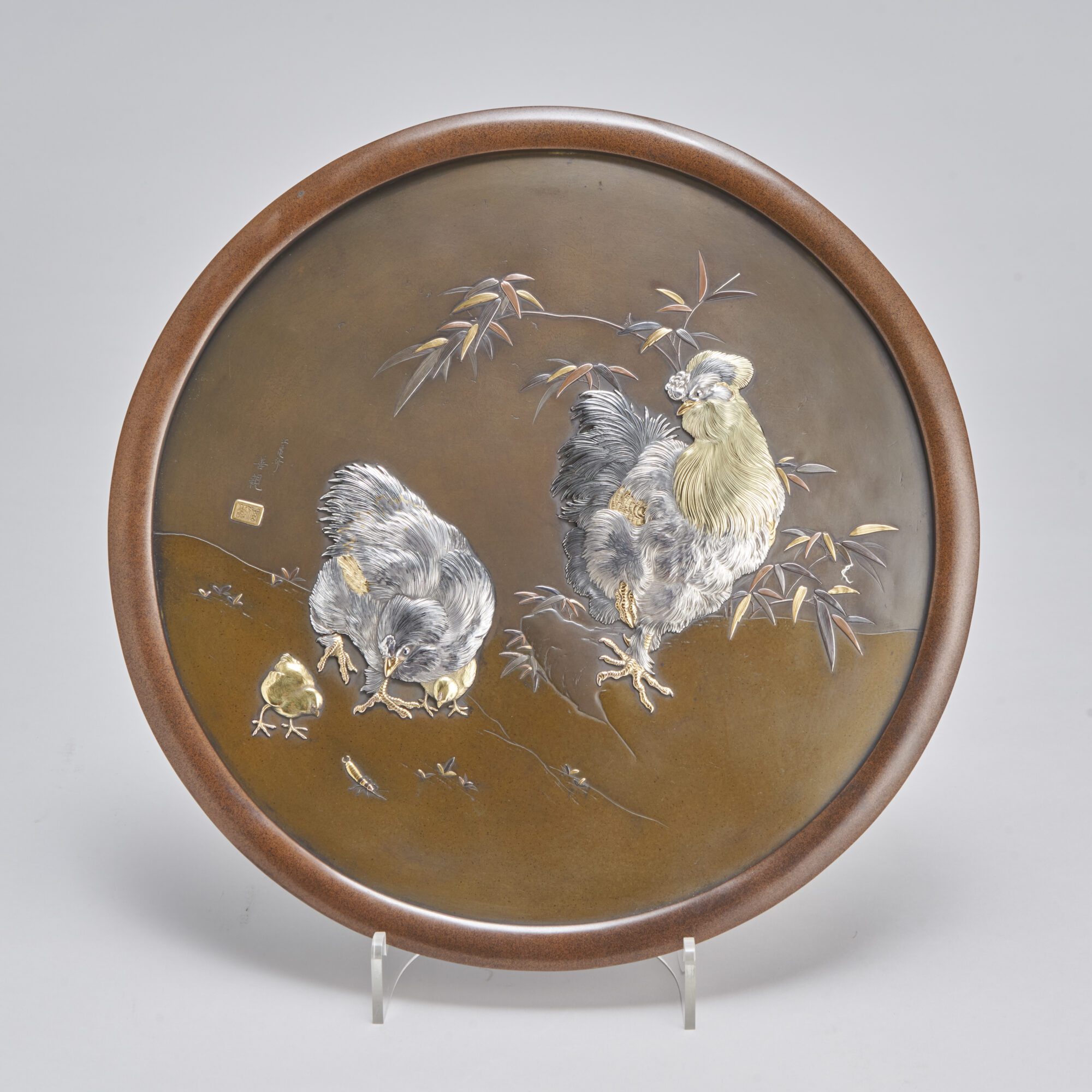 A Japanese bronze and multi-metal dish from Kevin Page