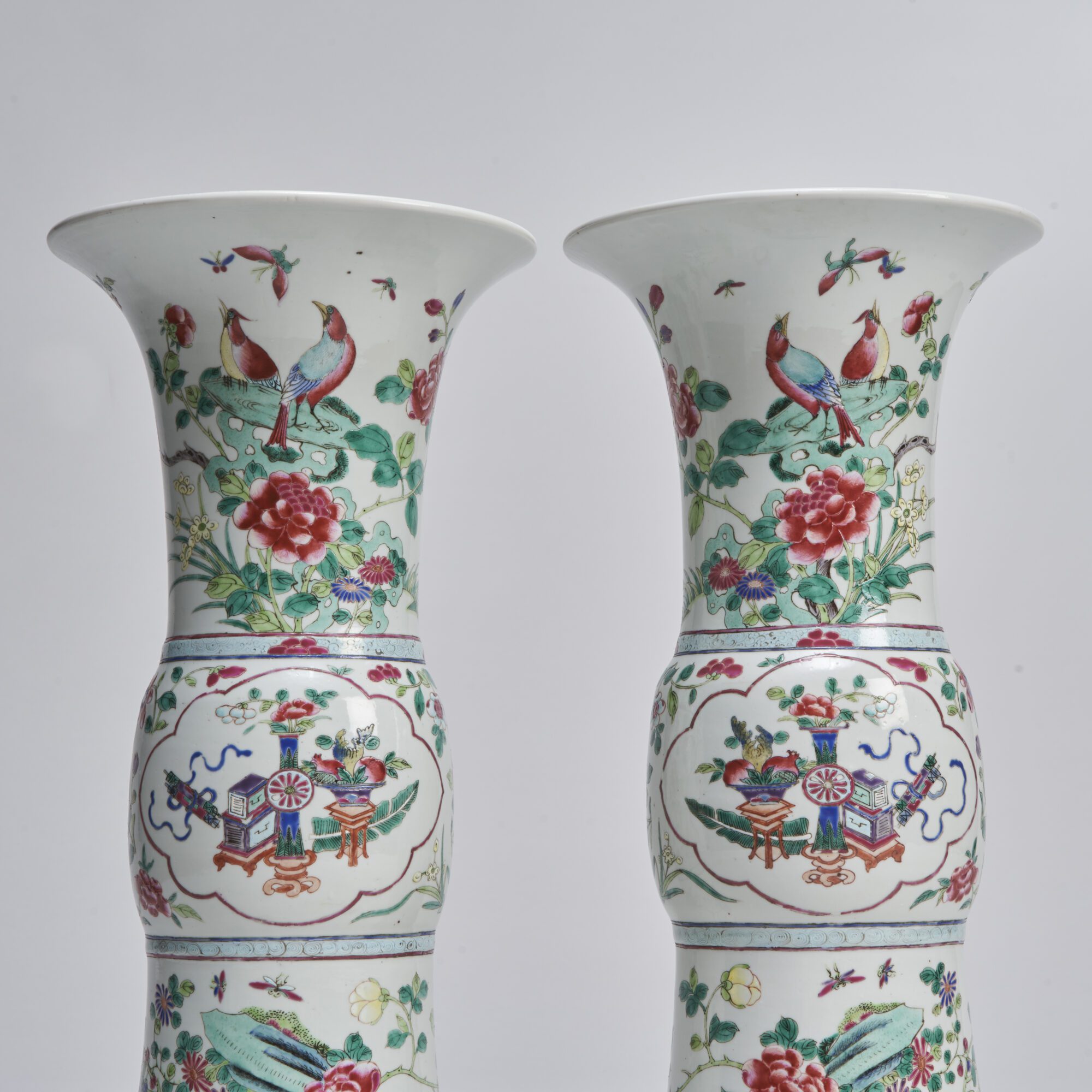 A pair of 19th Century Chinese porcelain Famille Rose beaker vases from Kevin page