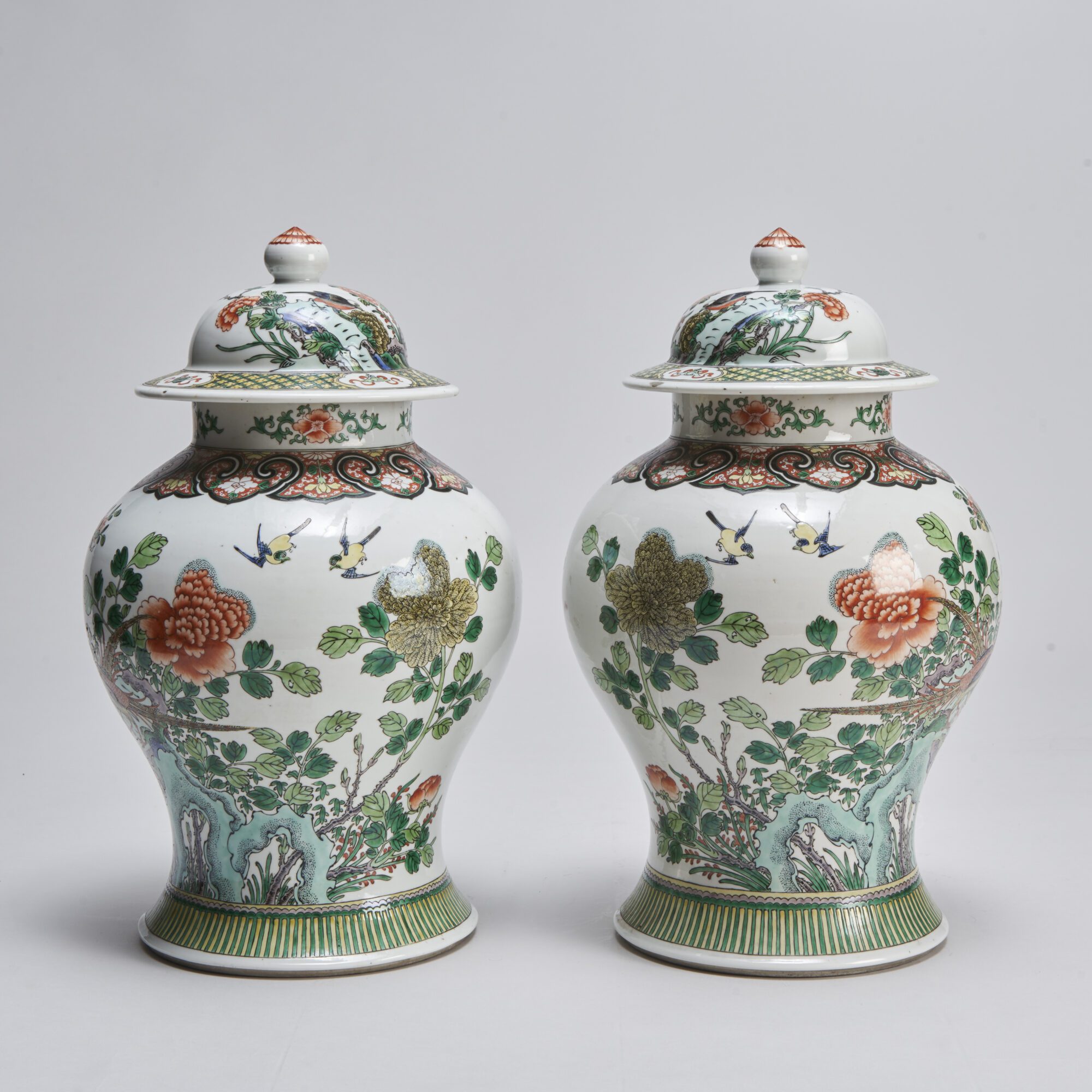 A pair of ceramic Chinese jars and covers from Kevin Page