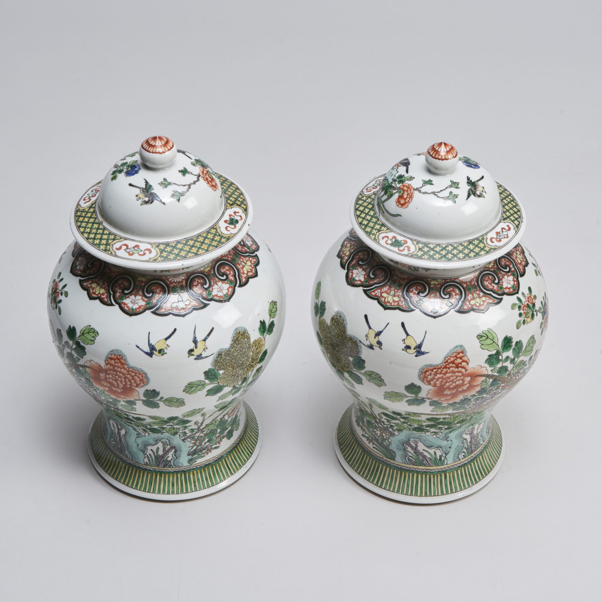 A pair of ceramic Chinese jars and covers from Kevin Page